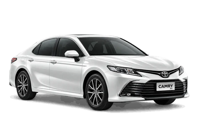 White Toyota Camry 2.5 V, right-facing front three-quarter view